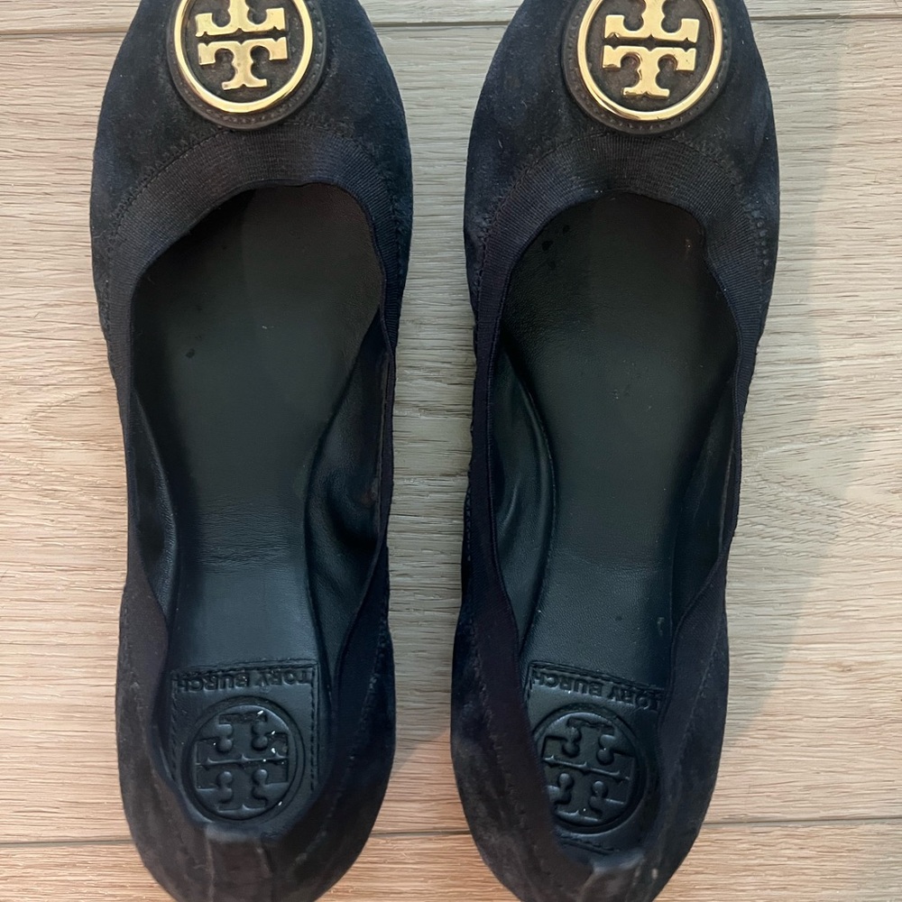Tory Burch Black and Gold Flats with Signature Medallion